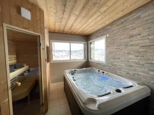 Chalets le bleu du lac Sauna et Spa : photos des chambres