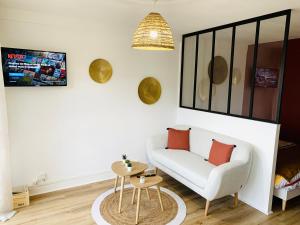 Appartements Studio ScandiChic tout equipe centre-gare-rives-clinique a pied : photos des chambres