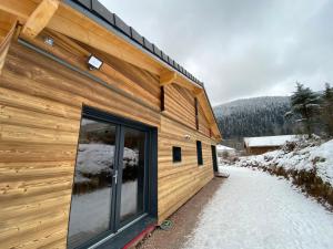 Les Chalets Perce Neige & Jacuzzi privatif, proximite Gerardmer & La Bresse : photos des chambres