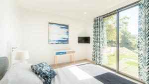Villas Villa Spacieuse avec Jacuzzi Privatif : photos des chambres