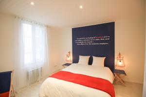 Appartements La Maison Bleue - En plein coeur d'Arcachon : photos des chambres