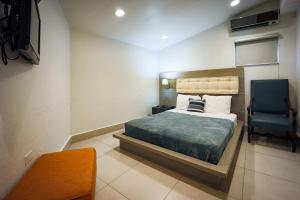 One-Bedroom Apartment room in Coral Suites