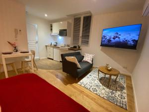 Appartements Le Charme - Au Coeur d'Agen - Self Checkin - Wifi - Netflix - Smart TV - Luqs fr : photos des chambres