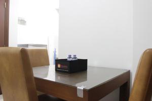 Homey 2BR Majesty Apartment near Maranatha University By Travelio