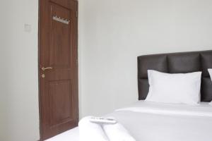 Homey 2BR Majesty Apartment near Maranatha University By Travelio