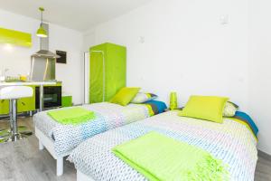 Appartements Studio Malpeigne : photos des chambres