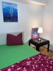 Two-Bedroom Apartment with Balcony and City View  room in UniriiCC
