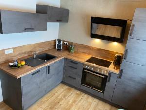 Ferienwohnung mit eigenem Garten und Bergblick