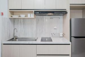 Cozy and Luxury 1BR Apartment at Scientia Residence By Travelio
