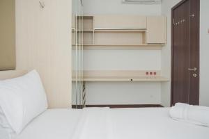 Cozy and Luxury 1BR Apartment at Scientia Residence By Travelio