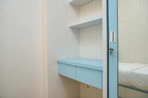 Gorgeous 2BR Green Pramuka Apartment By Travelio