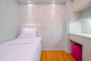 Cozy Stay 2BR Bassura City Apartment By Travelio