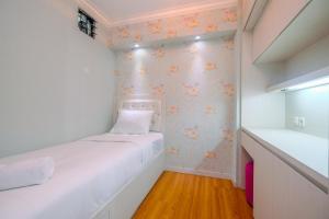 Cozy Stay 2BR Bassura City Apartment By Travelio