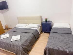 Deluxe Double Room with Extra Bed room in RM Guest House