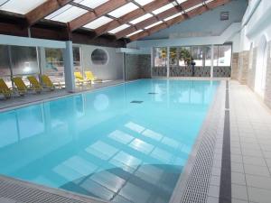Maisons de vacances Bungalow de 2 chambres avec piscine partagee terrasse amenagee et wifi a Saint Jean de Monts : photos des chambres