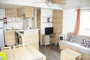 Campings MHVACANCES LOUENT PLUSIEURS MOBILHOMES DANS CAMPING 4 ETOILES PROCHE CHATEAUX et ZOO BEAUVAL : photos des chambres