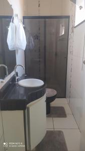 Pousada Quarto Suíte Famíliar com ar,frigobar, wi fi e garagem