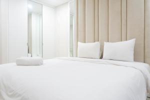 Spacious 1BR Apartment at Praxis By Travelio