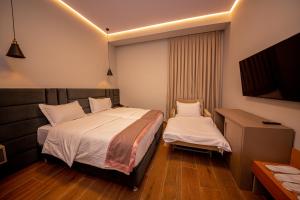 Economy Quadruple Room - Ground Floor room in City Center Hotel