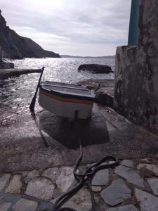 The monk boathouse Milos Greece