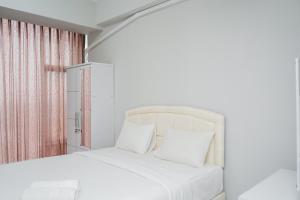 Fully Furnished Studio with Comfort Design Majestic Point Serpong Apartment By Travelio