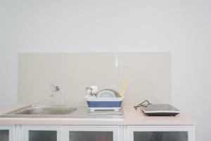 Fully Furnished Studio with Comfort Design Majestic Point Serpong Apartment By Travelio