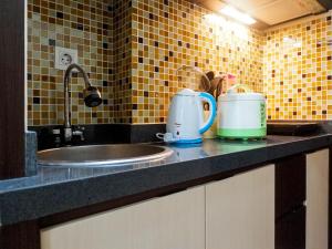 Strategic and Cozy Studio Room Apartment at Tamansari Papilio By Travelio