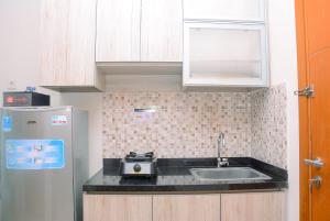 Cozy with Brand New 2BR Apartment Woodland Park Residence By Travelio