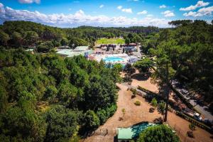 Appartements LE COTTAGE VUE LAC-2 velos-Village Vacances Nature de 70ha! avec piscines et animations : photos des chambres
