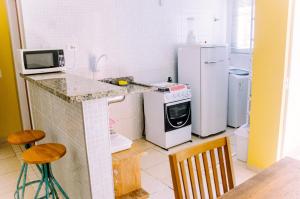 Apto no ItaguĆ”, 2 dts, wifi, piscina e ar condicionado