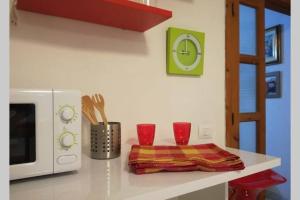 Big relax apartment with swimming pool and a peaceful garden in a private villa