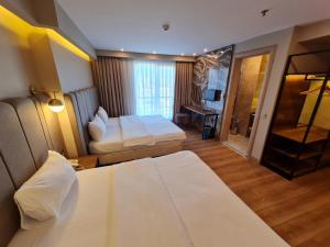 Standard Triple Room room in Air Boss Istanbul Airport and Fair Hotel