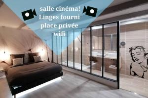 Appartements Maison tout equipee! Avec SALLE DE CINEMA!!! : photos des chambres