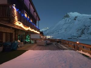 Chalet Canvolan, 7 pièces, 12 personnes, Tignes le Lac, sur terrasse et jardin
