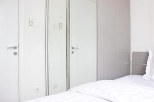 Chic and Comfy 2BR Apartment at Parahyangan Residence near UNPAR By Travelio