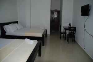 Hotel Coastalbay 2 & Golf Cart Rental