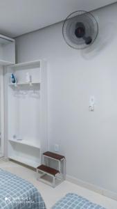 Flat familiar com ar,wi fi,cozinha e garagem