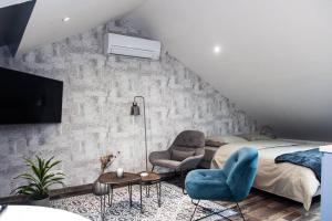 Appartements Le Studio 40 : photos des chambres