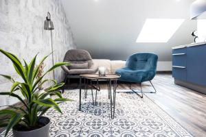 Appartements Le Studio 40 : photos des chambres