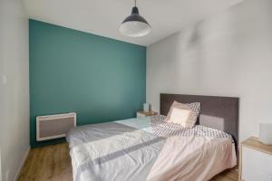 Appartements Le Batelier : photos des chambres