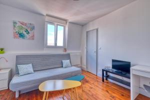 Appartements Faubourg 5 d'isle Studio Cosy proche gare IUT : photos des chambres