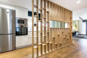 ELEVEN Real de la Carretería, by Homing U