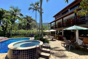 Magnífica casa pé na areia 4 suítes c ar e piscina