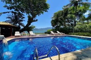 Magnífica casa pé na areia 4 suítes c ar e piscina