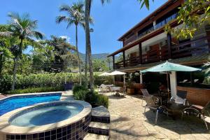 Magnífica casa pé na areia 4 suítes c ar e piscina