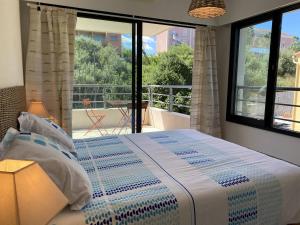 Appartements Cote Plage pied dans l'eau vue mer : photos des chambres