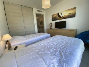 Appartements Cote Plage pied dans l'eau vue mer : photos des chambres
