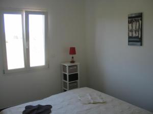 Appartements Les Romarins : photos des chambres