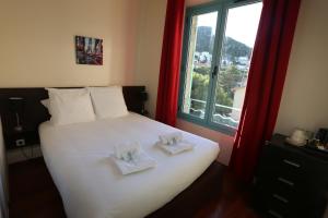 Appart'hotels O'Sullivans Bar and Hotel : photos des chambres