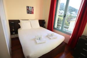 Appart'hotels O'Sullivans Bar and Hotel : photos des chambres